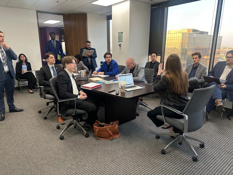5 Pillar Solutions leaders meeting around a conference table